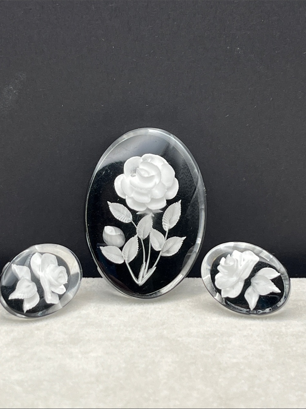 Vintage black and white floral lucite brooch with screw back earrings